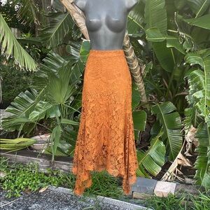 Rust lace asymmetric skirt by Nora, Cora